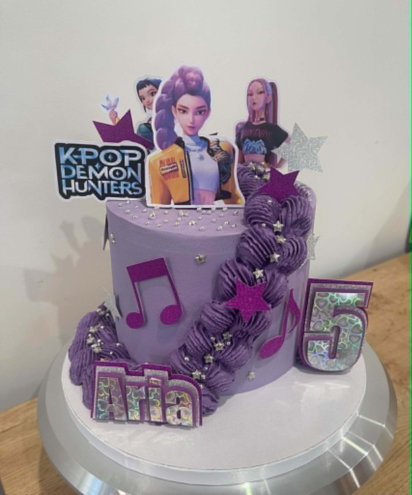 Purple K-Pop Demon Hunters 5th birthday cake for Aria